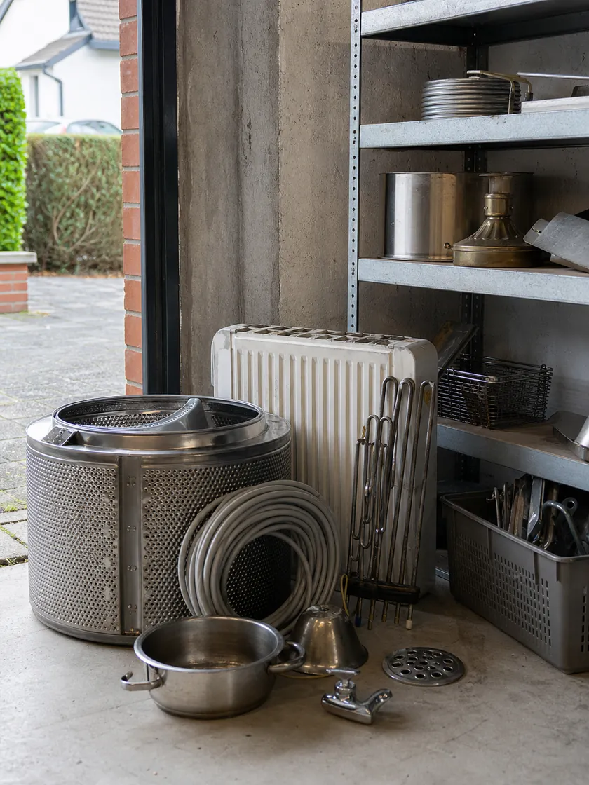 Heizkörper, Waschmaschinentrommel, Kabel und Haushaltsmetall für die Schrottabholung Essen